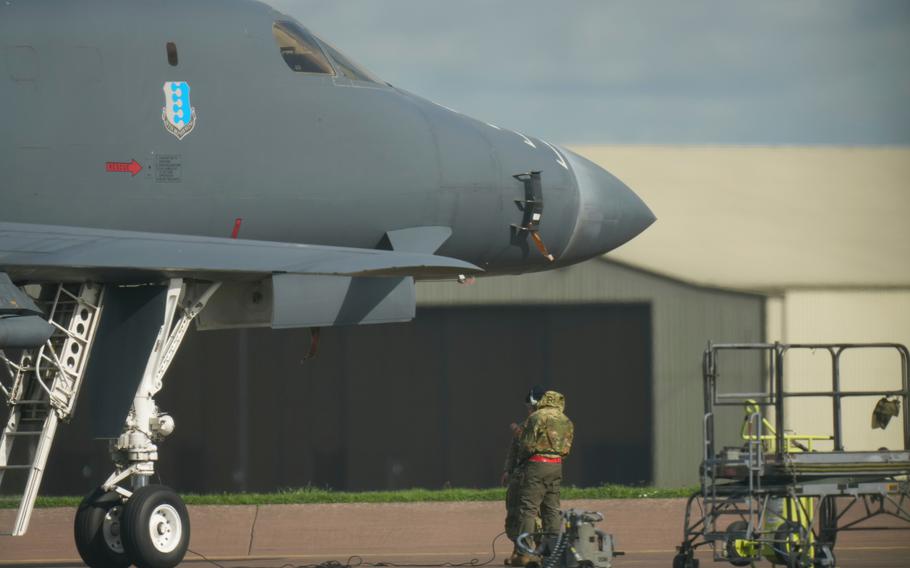 U.S. airmen work on a B-1 bomber.